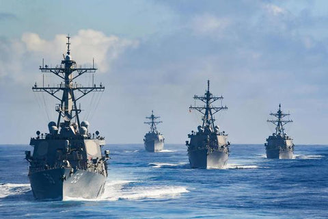 Four US Navy warships at sea