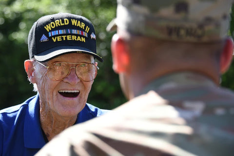 world war II veteran smiling wearing custom military cap