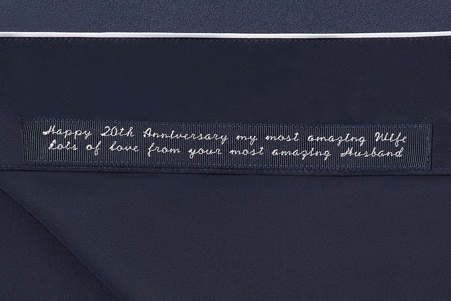 Close up of secret messaging on a navy pyjama