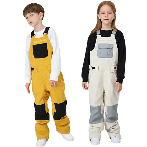 Boy and girl wearing yellow and white snow bibs with contrasting accents.