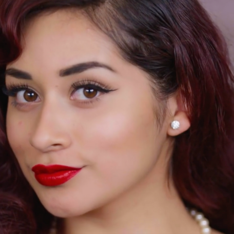 Brunette Woman Wearing Bésame Cosmetics Makeup and Pearl Necklace