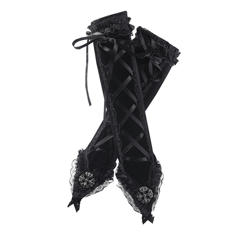 Channel Victorian Elegance with Black Lace-Up Gloves.