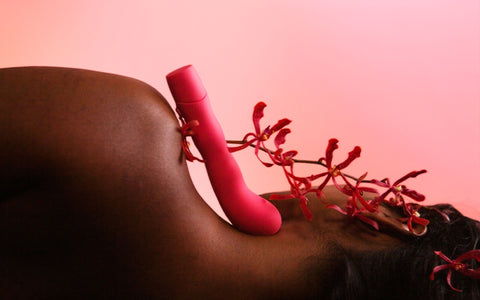 person laying with The Romantic vibrator leaning on their shoulder