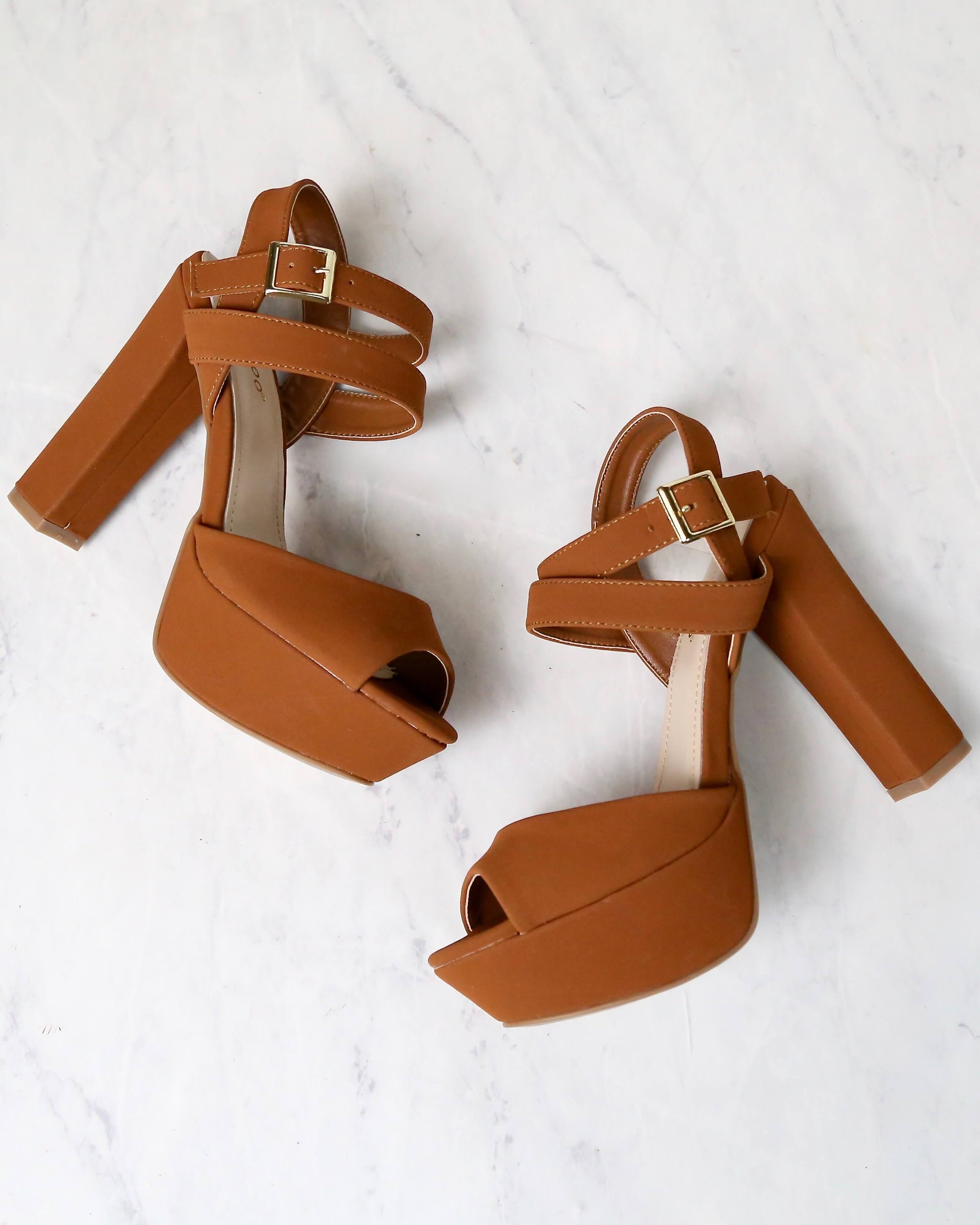 tan platform pumps