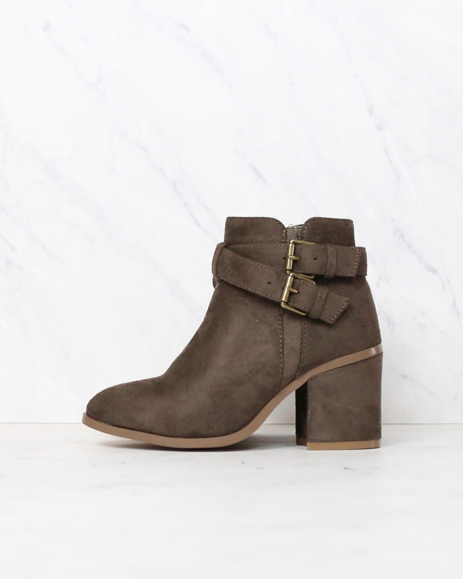 A Grand Entrance Faux Suede Ankle Bootie With Buckle Detail in More Co ...