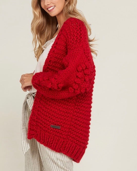 red cardigan sweater