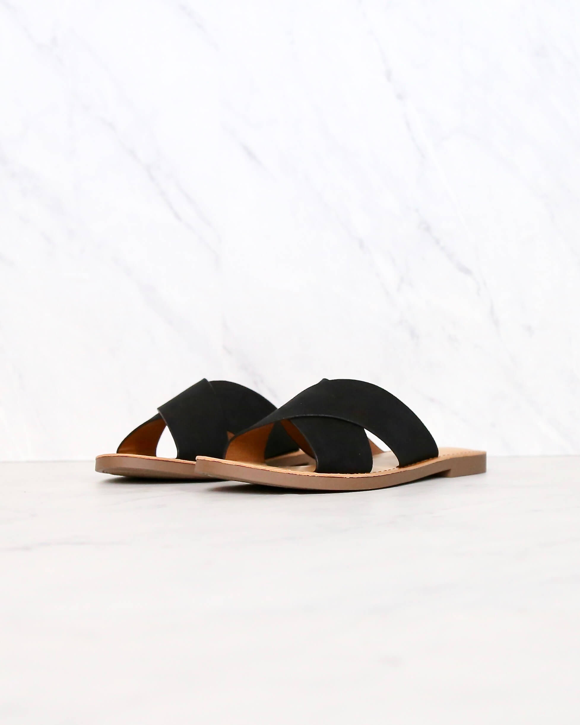 black cross sandals