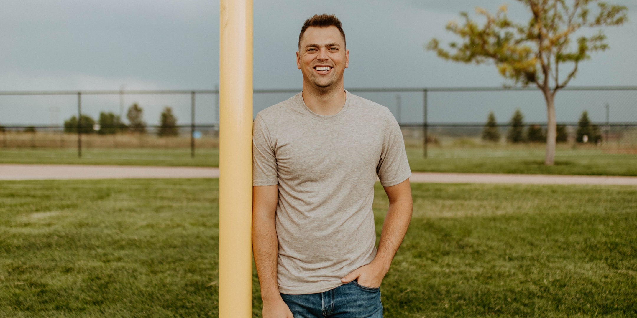 Tall Guy Wearing Tall T-Shirt