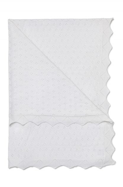 white cotton baby blanket