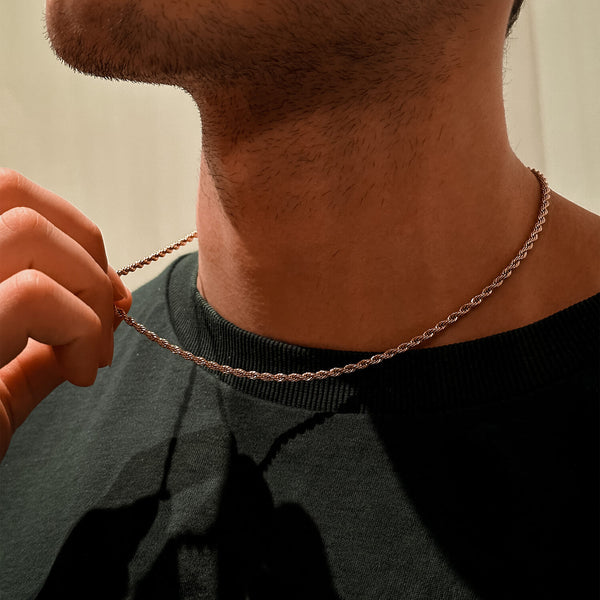 male wearing 3mm gold rope chain on green tshirt