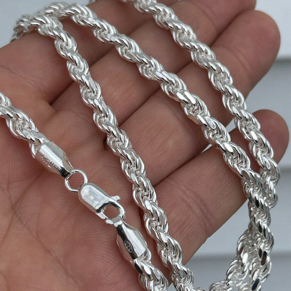 person holding 3mm sterling silver rope chain