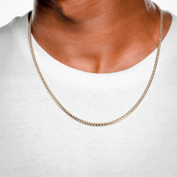 male wearing gold Franco chain