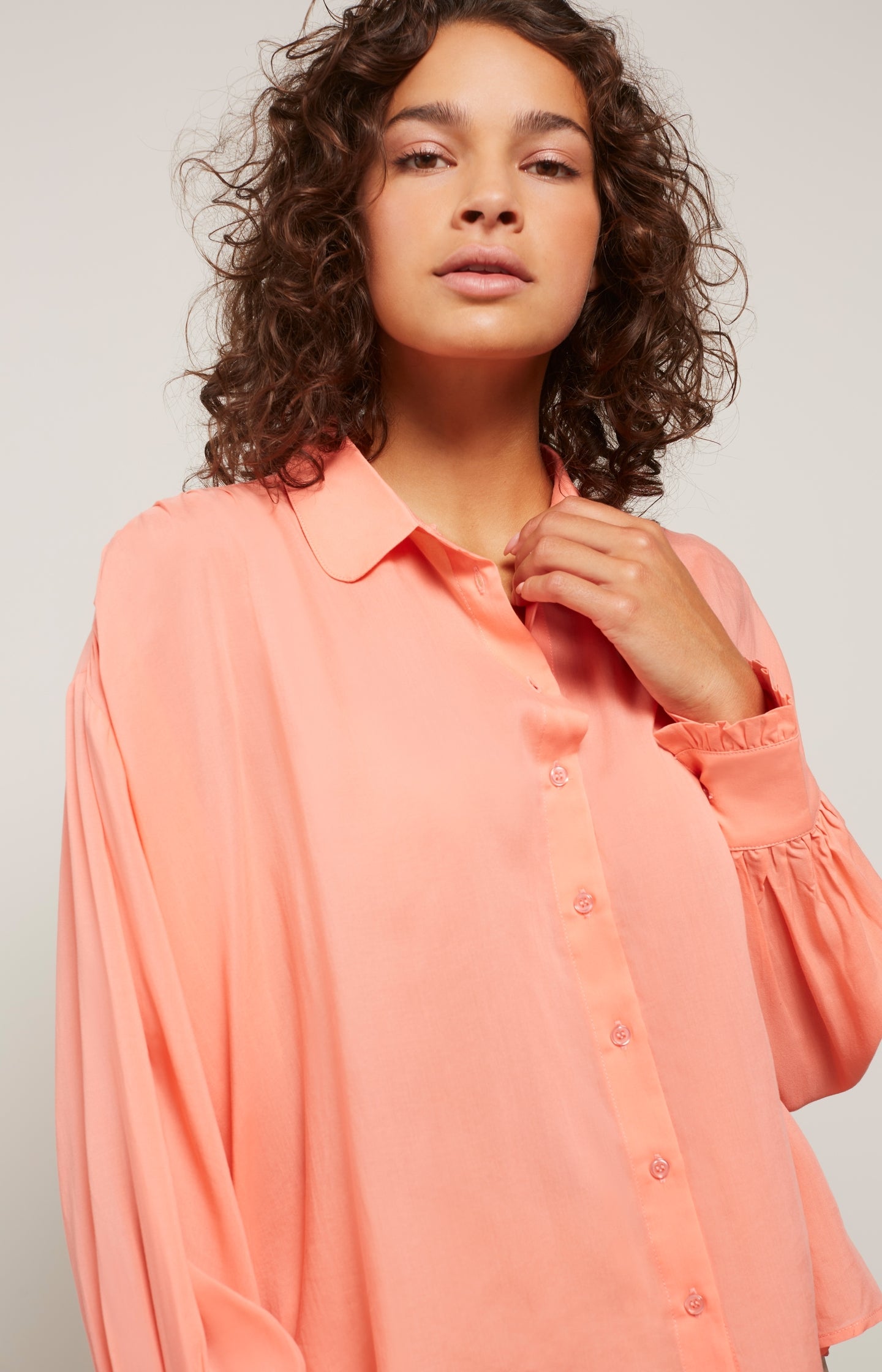 Blouse with long balloon sleeves, buttons and pleated detail