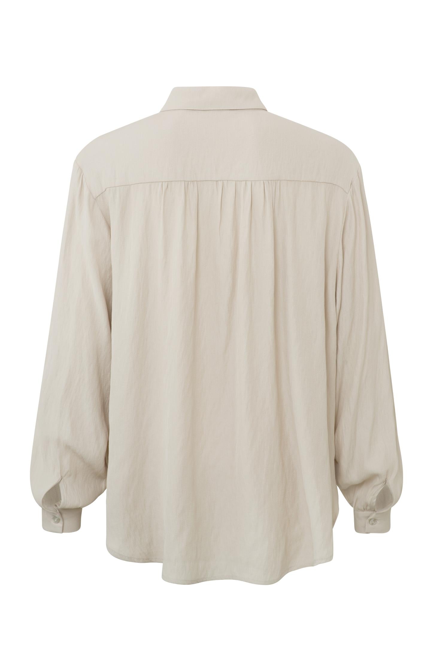Flowy blouse with long balloon sleeves and pleated details
