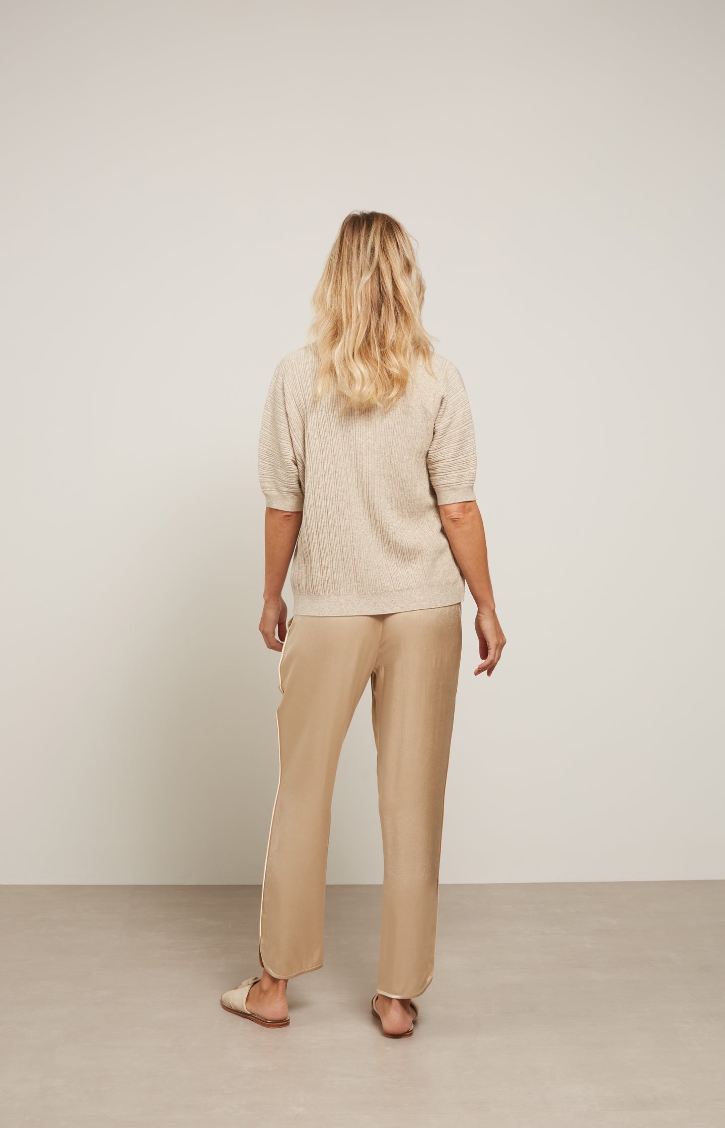 Satin jogging trousers with elastic waist and side pockets