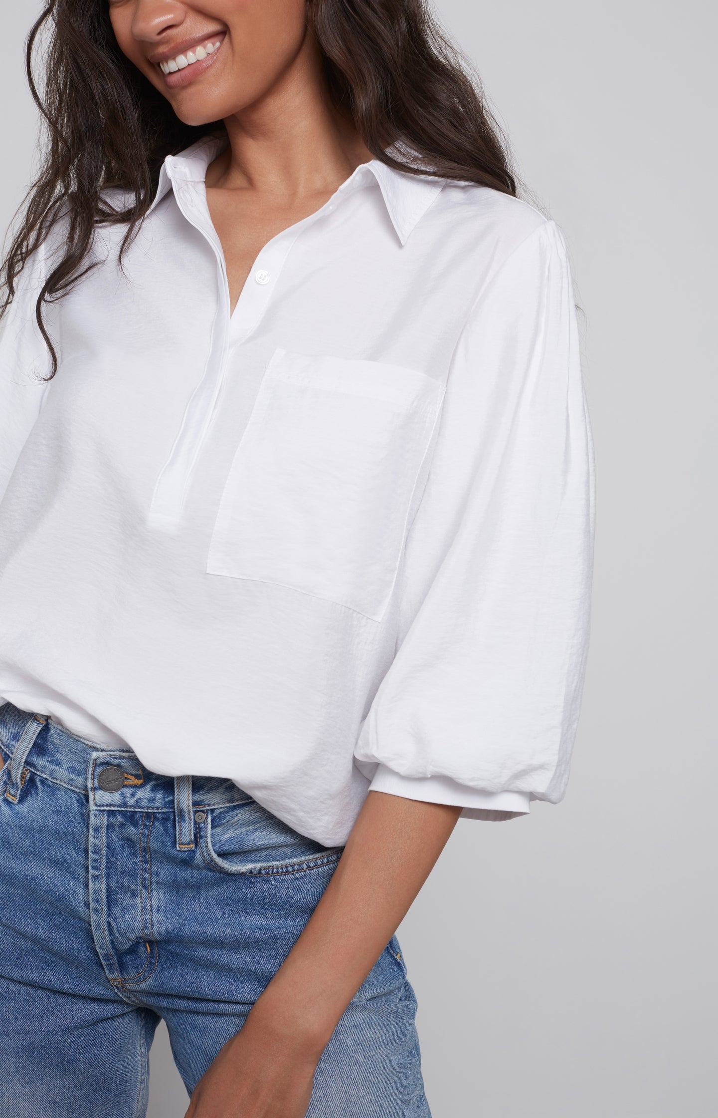 Top with mid-length balloon sleeves, chest pocket and button