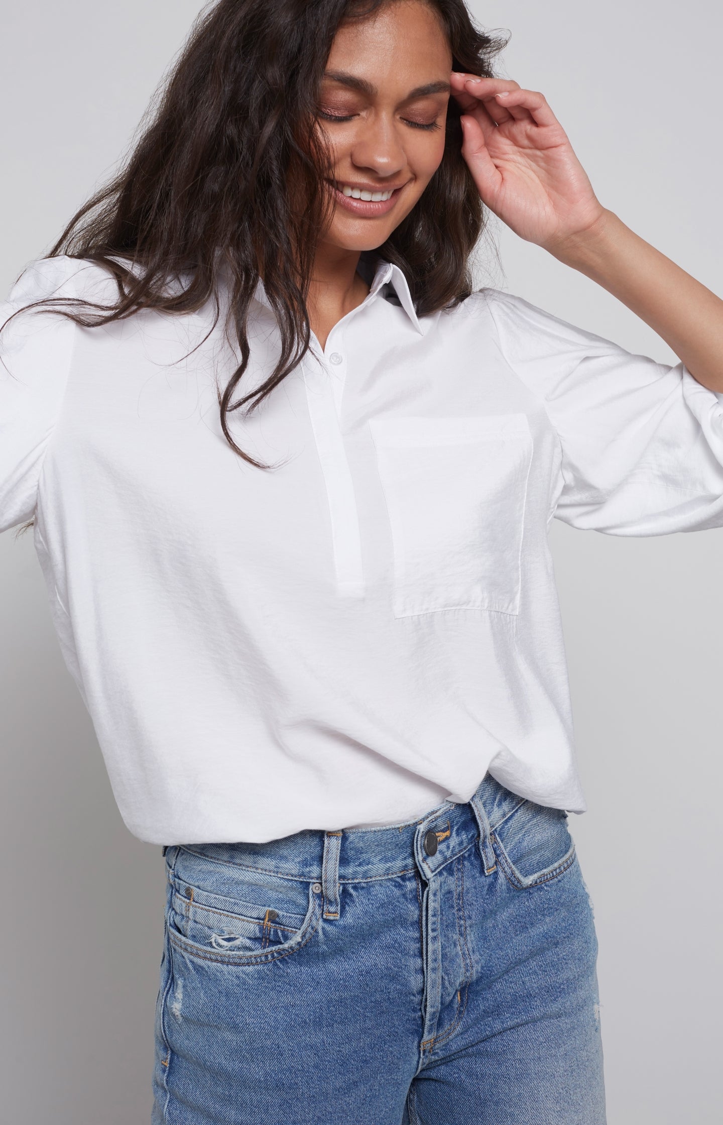 Top with mid-length balloon sleeves, chest pocket and button