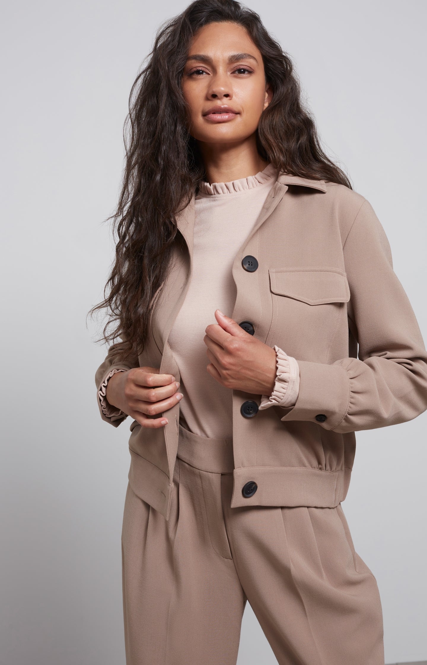Woven jacket with long sleeves, breast pockets and buttons