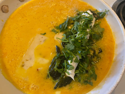 poblano omelet in a skillet