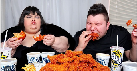 people eating fried chicken