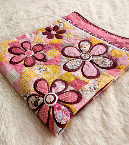 "Blooming Meadow" quilt with flowers