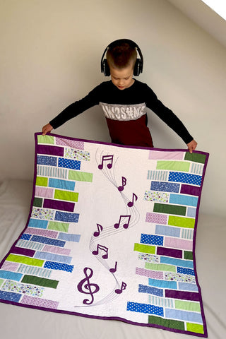 Boy with the "Sound of Music" quilt