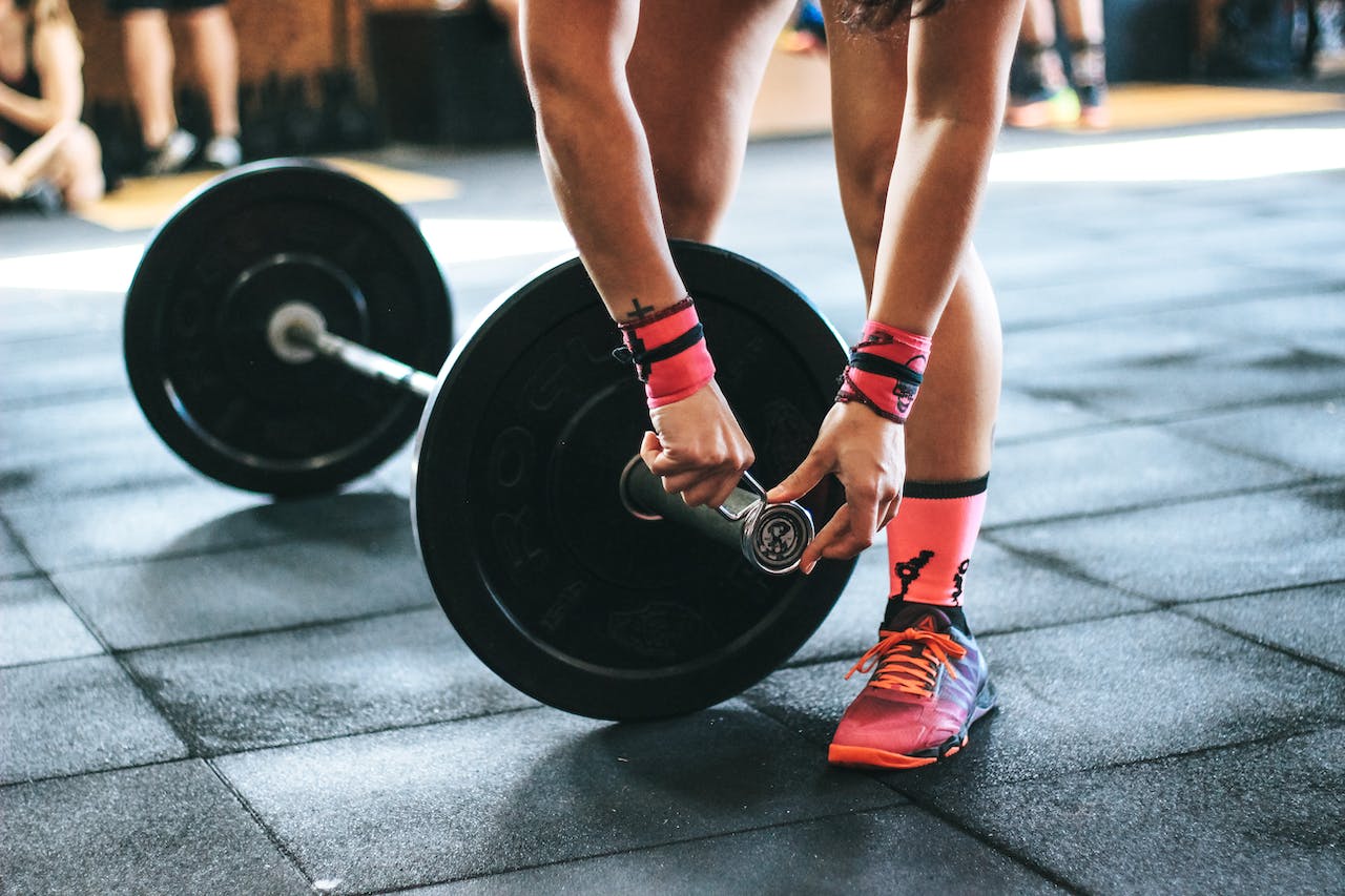 A person preparing to lift weights