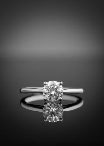 Diamond engagement ring with Claddagh setting