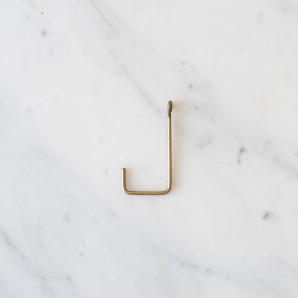 https://cdn.shopify.com/s/files/1/0643/7303/1137/products/BRASS-SINGLE-HOOK-SMALL_600x600.jpg?v=1680280207