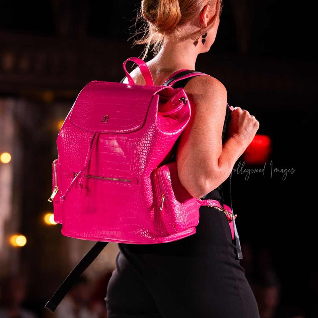 Model on runway with backpack at New York Fashion Week