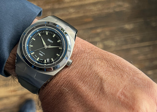 Our beautiful blue bezel matched with a navy jacket.