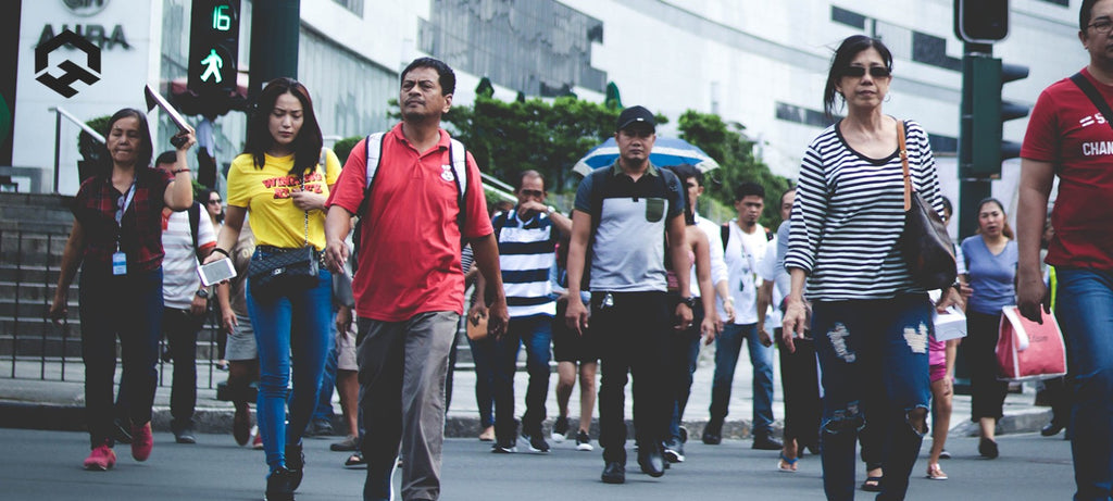 Busy Professionals walking in the street of Manila