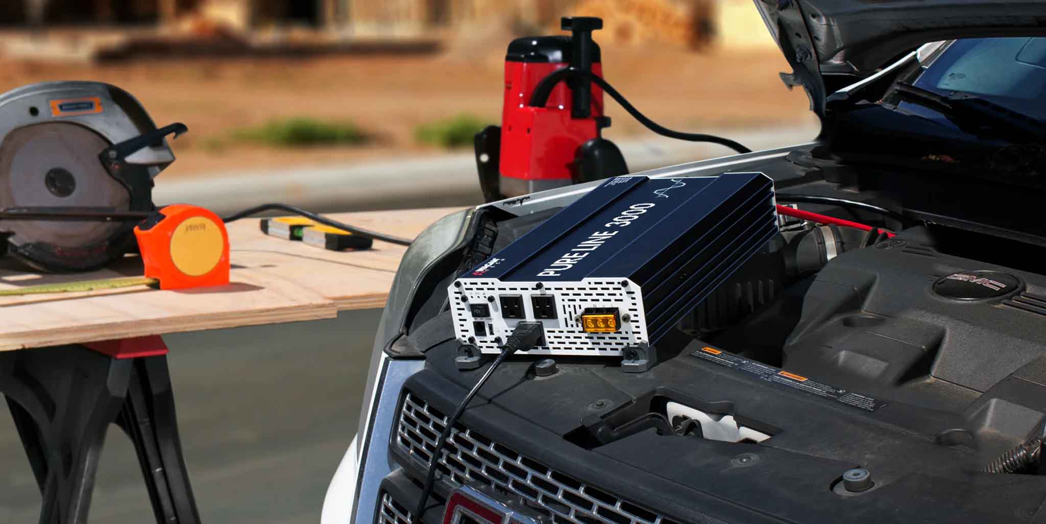 Power Inverter Connected To A Truck Battery At A Construction Site