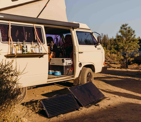 Zamp Solar Portable Solar Panel Charging Near A Van