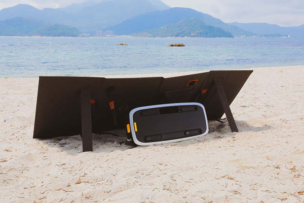 ZERO BREEZE Mark 2 Battery Charged By Solar Panels On A Beach