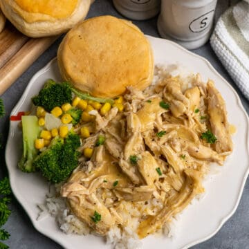 Chicken and GraVY ON A PLATE WITH BISCUIT