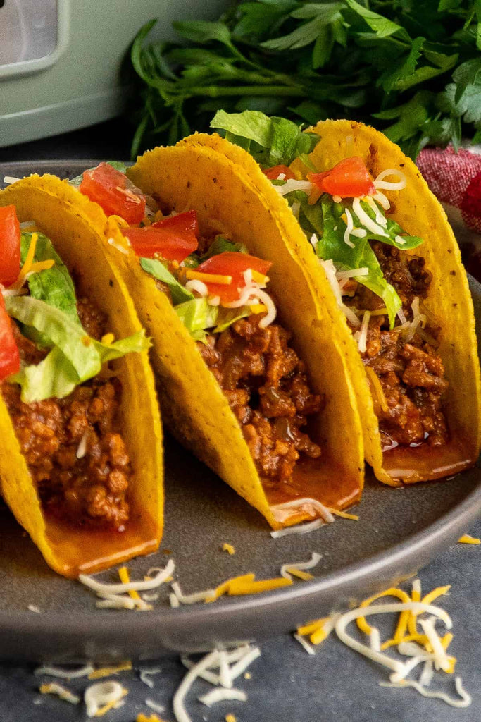 Taco Meat Cooked in a Slow Cooker Served as Taco's