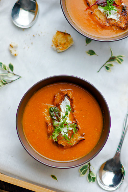 Roasted Tomato Soup in a bowl setting on table