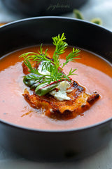 Roasted Tomato Soup in a skillet with garnish