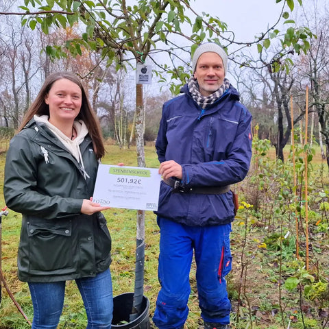 Handing over the donation check