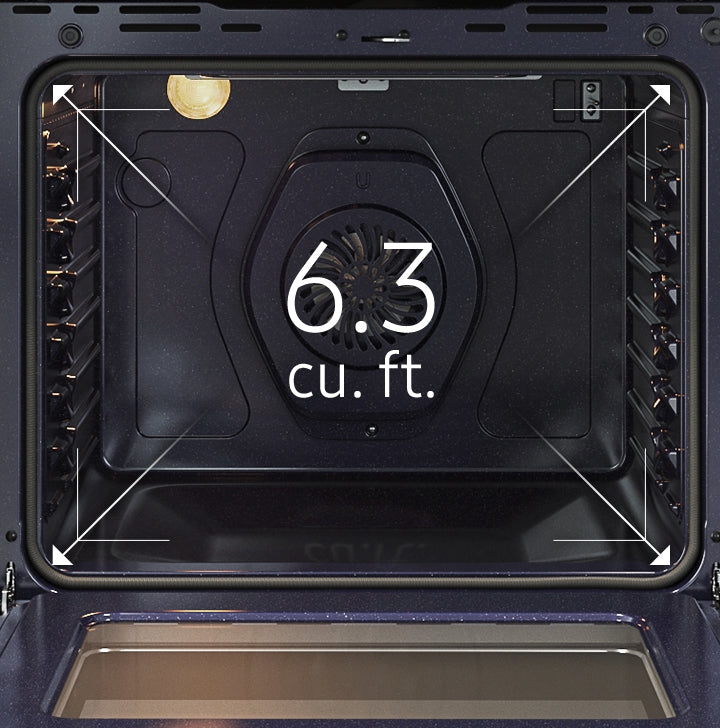 A close-up of the spacious inside of the oven with arrows illustrating its 6.3 cu. ft. capacity.