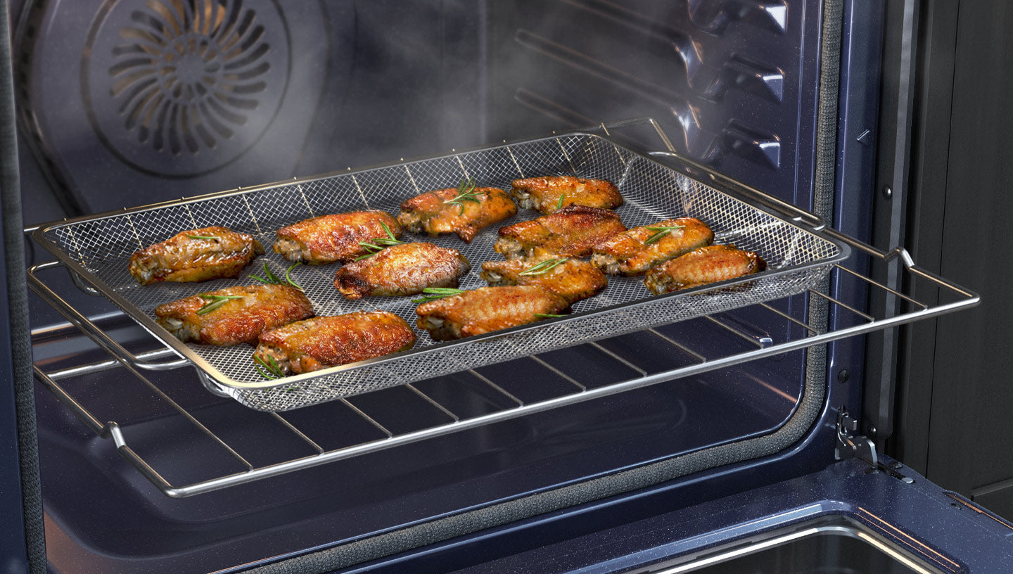 Shows food being fried inside the oven using Air Fry, with only a small amount of oil, so it is crispy and brown outside.