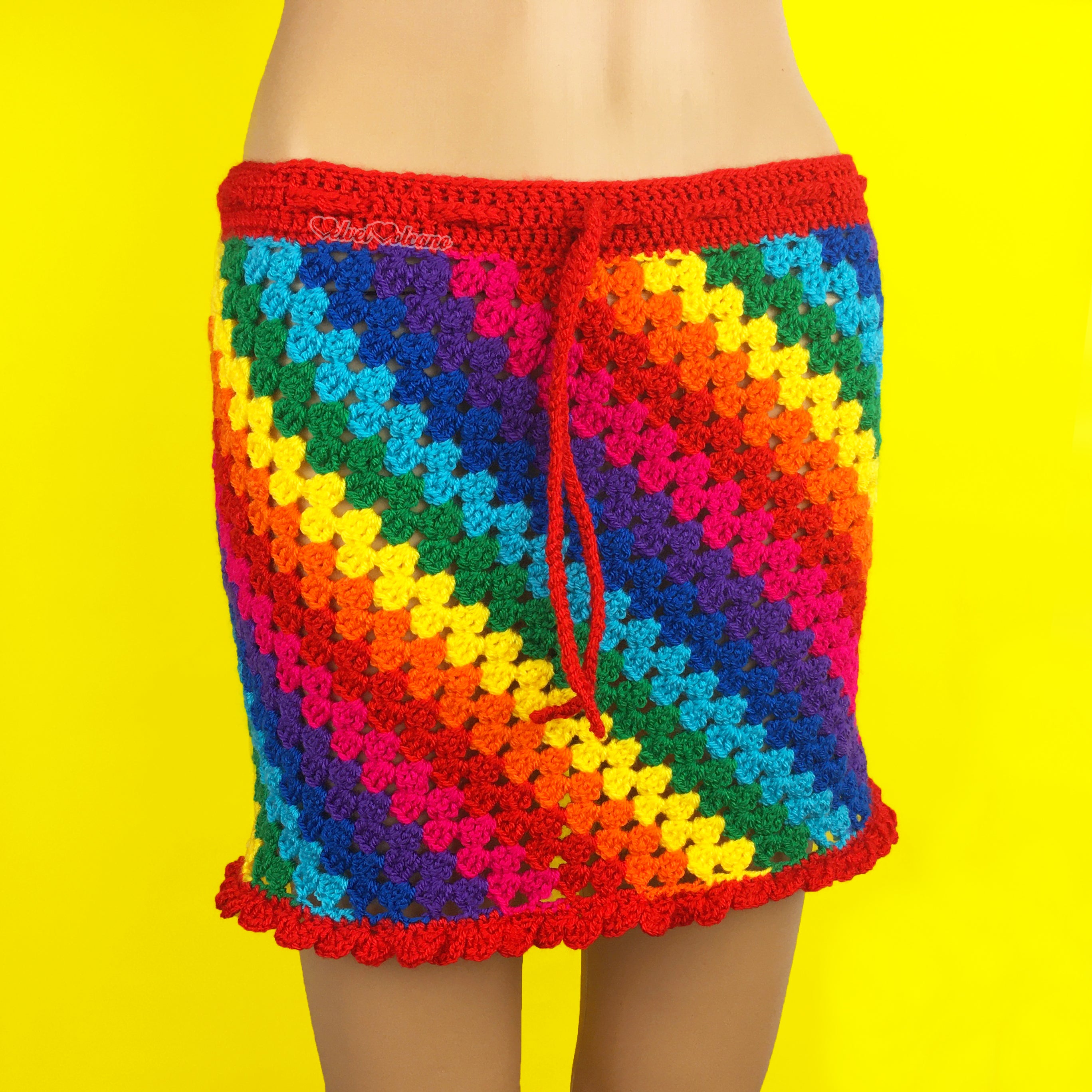 Crocheted skirt in a diagonal rainbow pattern