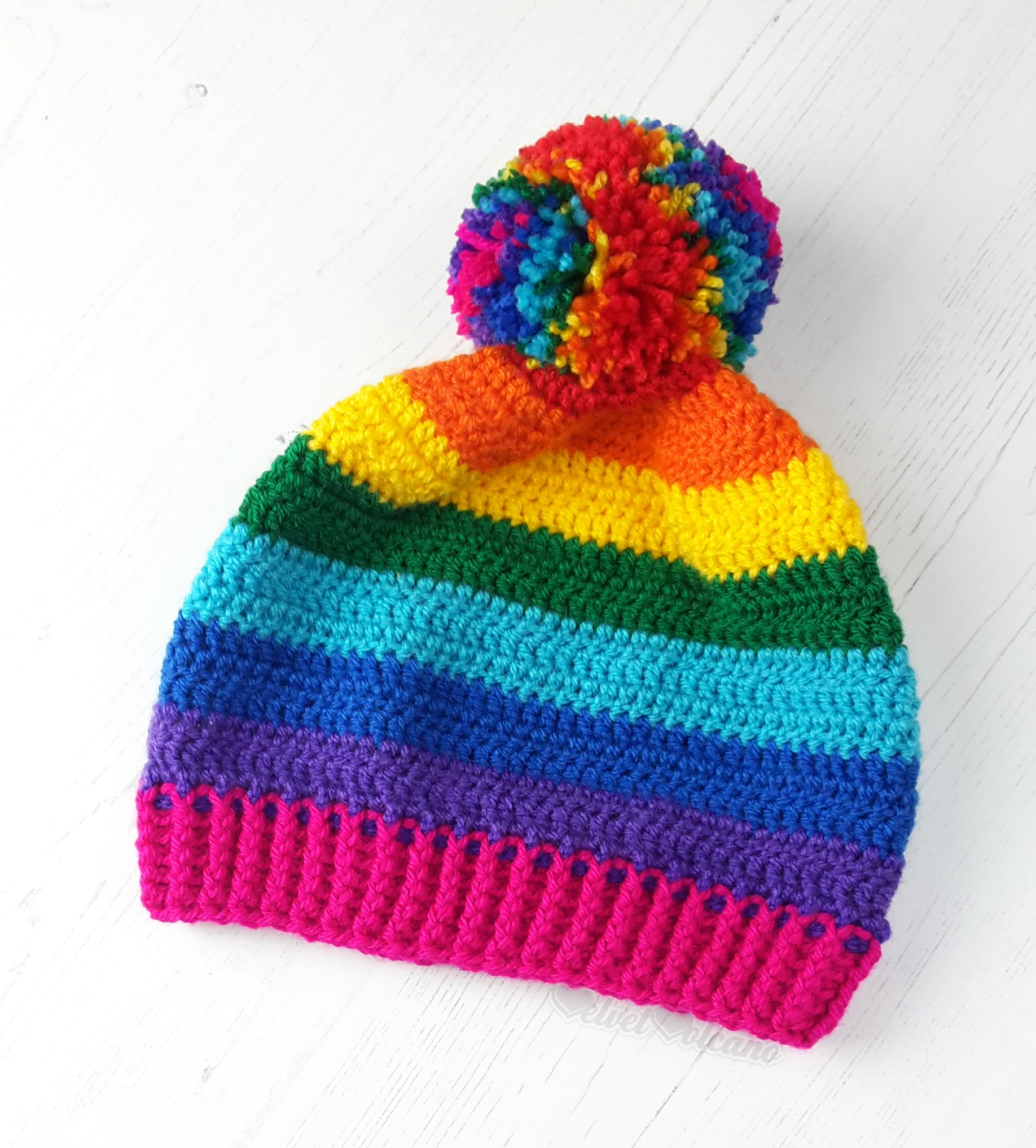 rainbow pom pom beanie