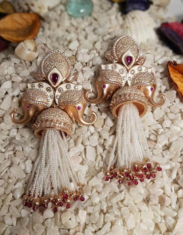 tassel earrings on saree
