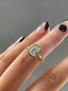 Journee - Bezel Set Emerald Solitaire Lifestyle Image