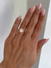 Avery – Double Tipped 4 Claw Oval Solitaire Lifestyle Image