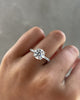 Charlie - 4 Claw Pavé Round Solitaire with Hidden Halo Lifestyle Image