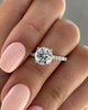 Charlie - 4 Claw Pavé Round Solitaire with Hidden Halo Lifestyle Image