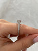 Melinda - 4 Claw Knife Edge Round Solitaire with Hidden Halo and Pavé Lifestyle Image